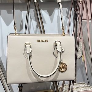 Michael Kors Sheila Medium Center Zip Satchel Crossbody Bag
Light Cream 
NWT